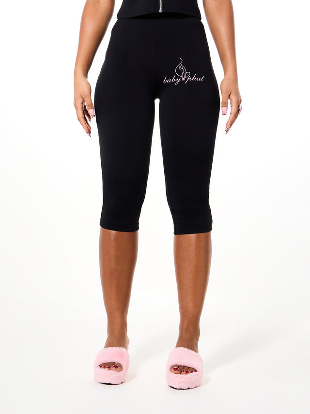 Logo Capri Legging, fitted black capri silhouette from front angle, front full-body view