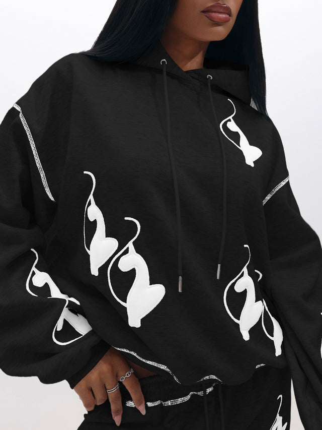 Logo Marled Hoodie, black relaxed fit with bold white logos, front view
