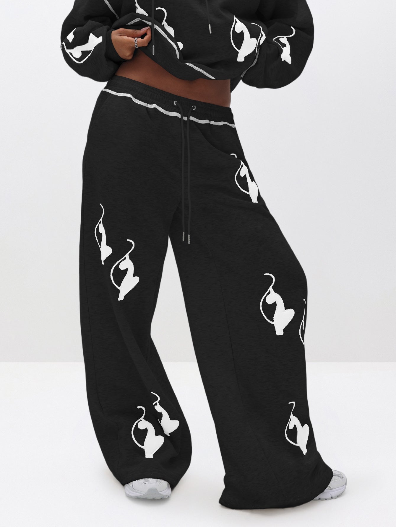 Logo Marled Sweatpant, black marled fabric with white cat logo print, front view