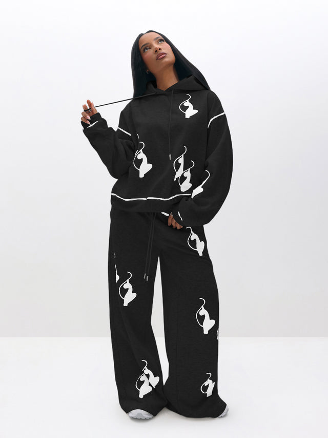Logo Marled Sweatpant, black wide-leg sweatpants styled with matching hoodie, on-model styling view