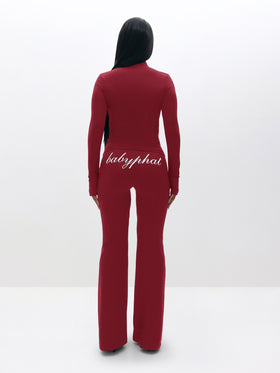 Long Sleeve High Neck Zip Up Top, rear burgundy silhouette with back script logo, back view