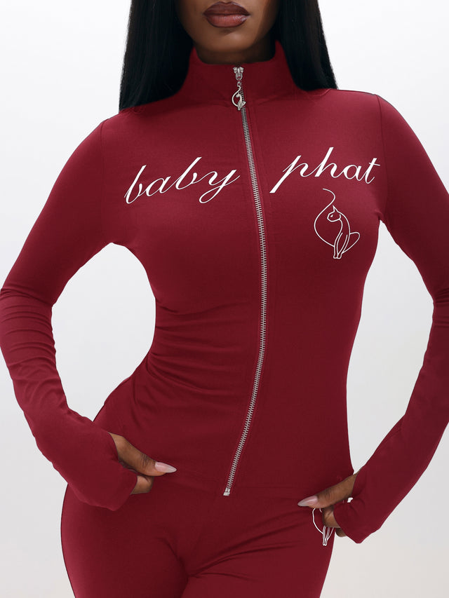 Long Sleeve High Neck Zip Up Top, high neck zipper with chest script logo in burgundy, close-up detail