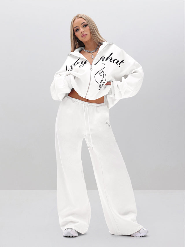 Baggy Sweatpants With Applique, white fleece with logo detail, on-model styling view
