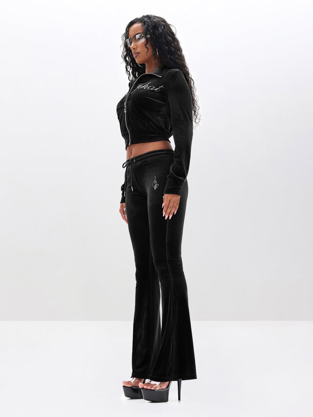Low Rise Velour Sweatpants With Rhinestones, black low-rise velour from profile angle, side view
