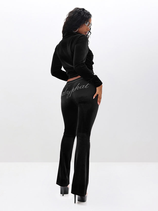 Low Rise Velour Sweatpants With Rhinestones, black velour silhouette from rear three-quarter angle, on-model styling view