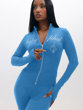 Long Sleeve High Neck Zip Up Top, sky blue fitted zip-front from angled pose, on-model styling view