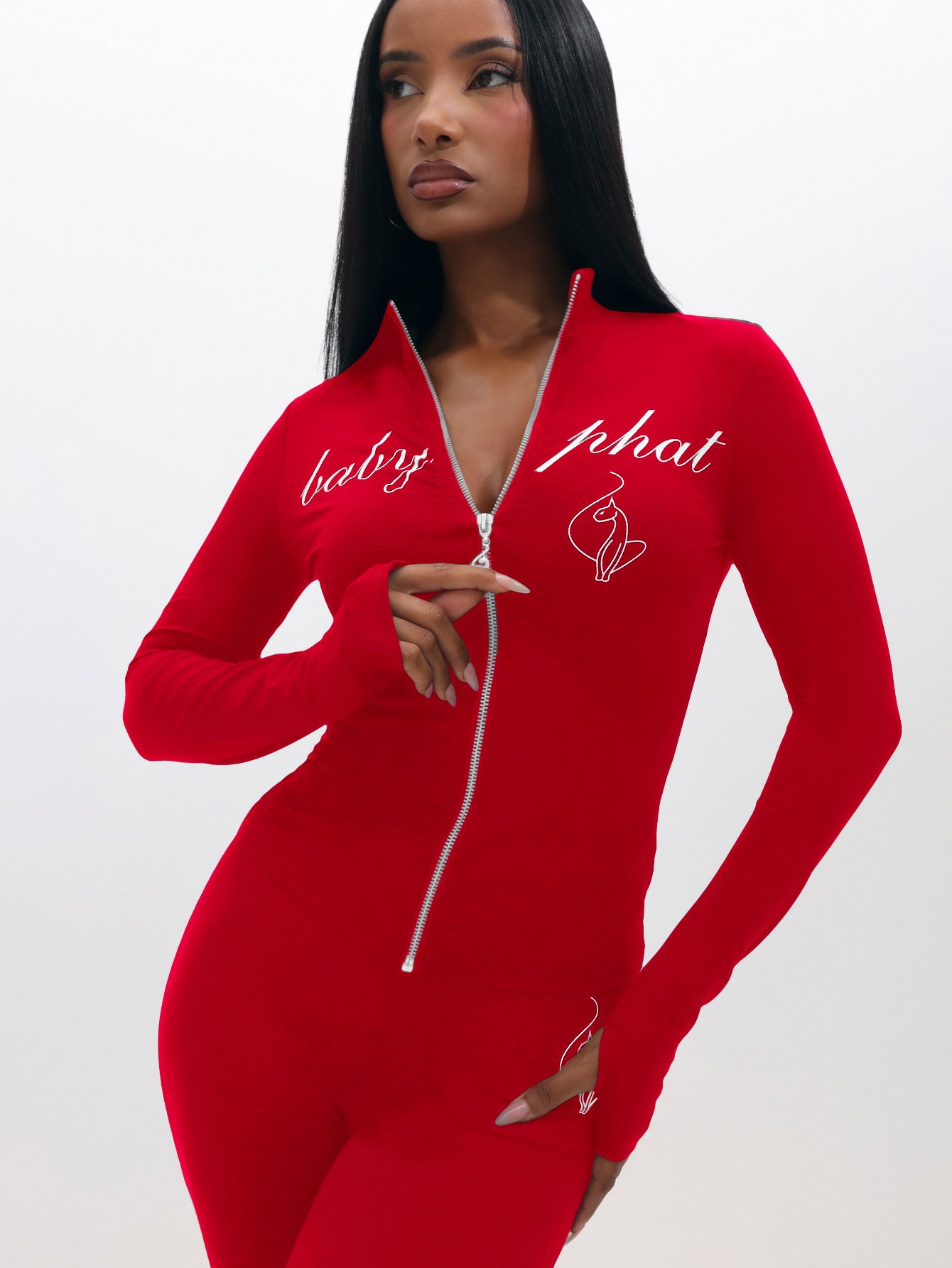 Long Sleeve High Neck Zip Up Top, bright red fitted zip-front silhouette from angle, front view