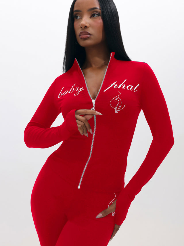 Long Sleeve High Neck Zip Up Top, bright red fitted zip-front silhouette from angle, front view