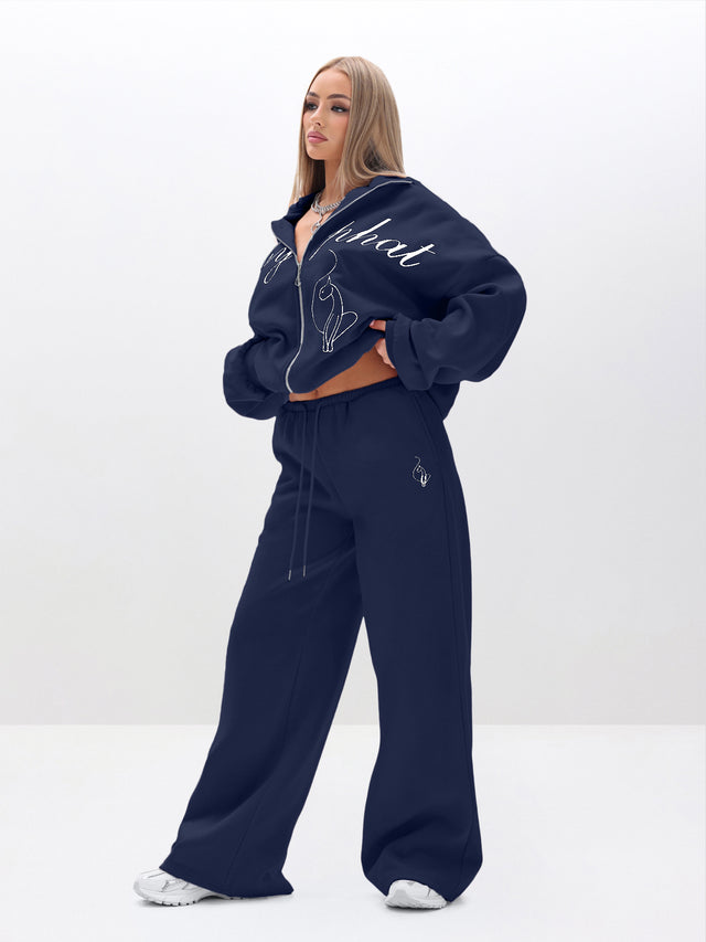 Baggy Sweatpants With Applique, navy wide-leg fit, side view