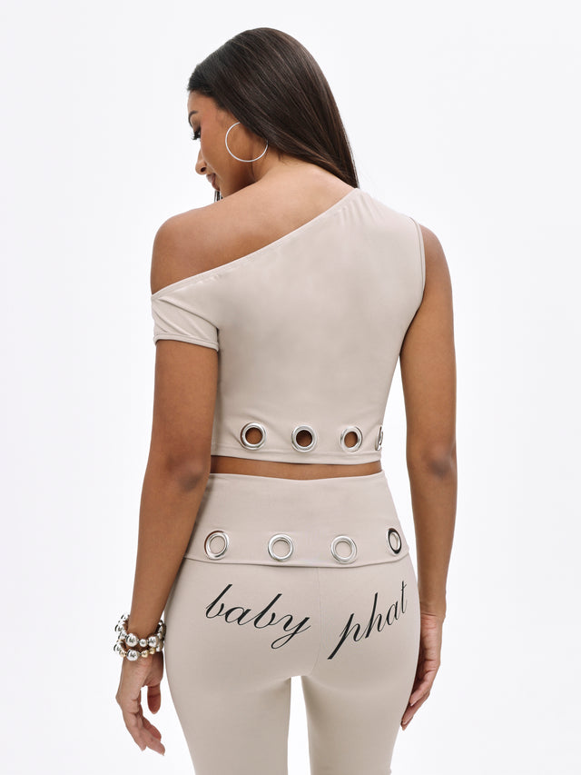 One Shoulder Eyelet Top, neutral asymmetrical cut with grommet trim, back view