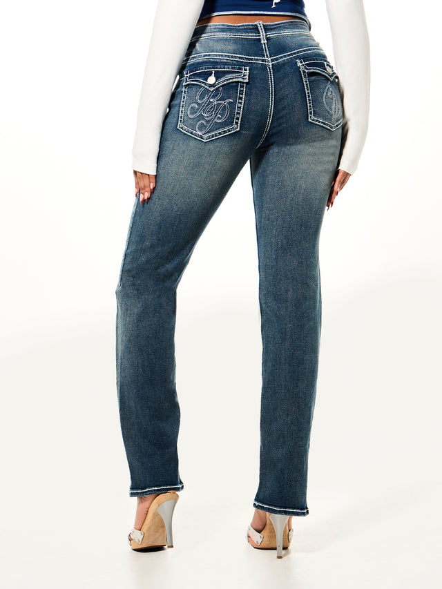 Straight Leg Jean, embroidered flap pockets and faded wash, back view