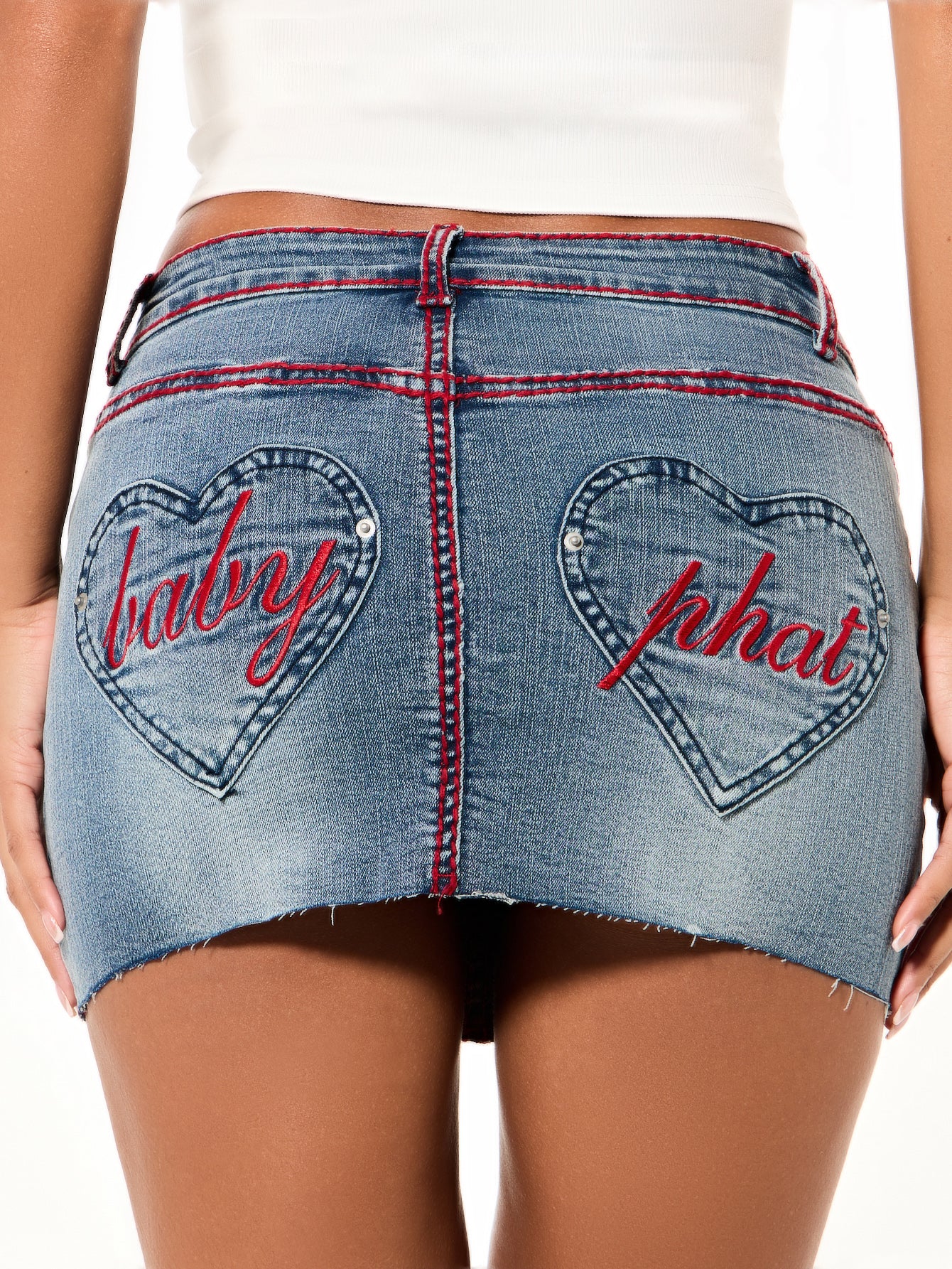 Denim Mini Skirt With Heart Pockets, heart-shaped back pockets with Baby Phat script, back view