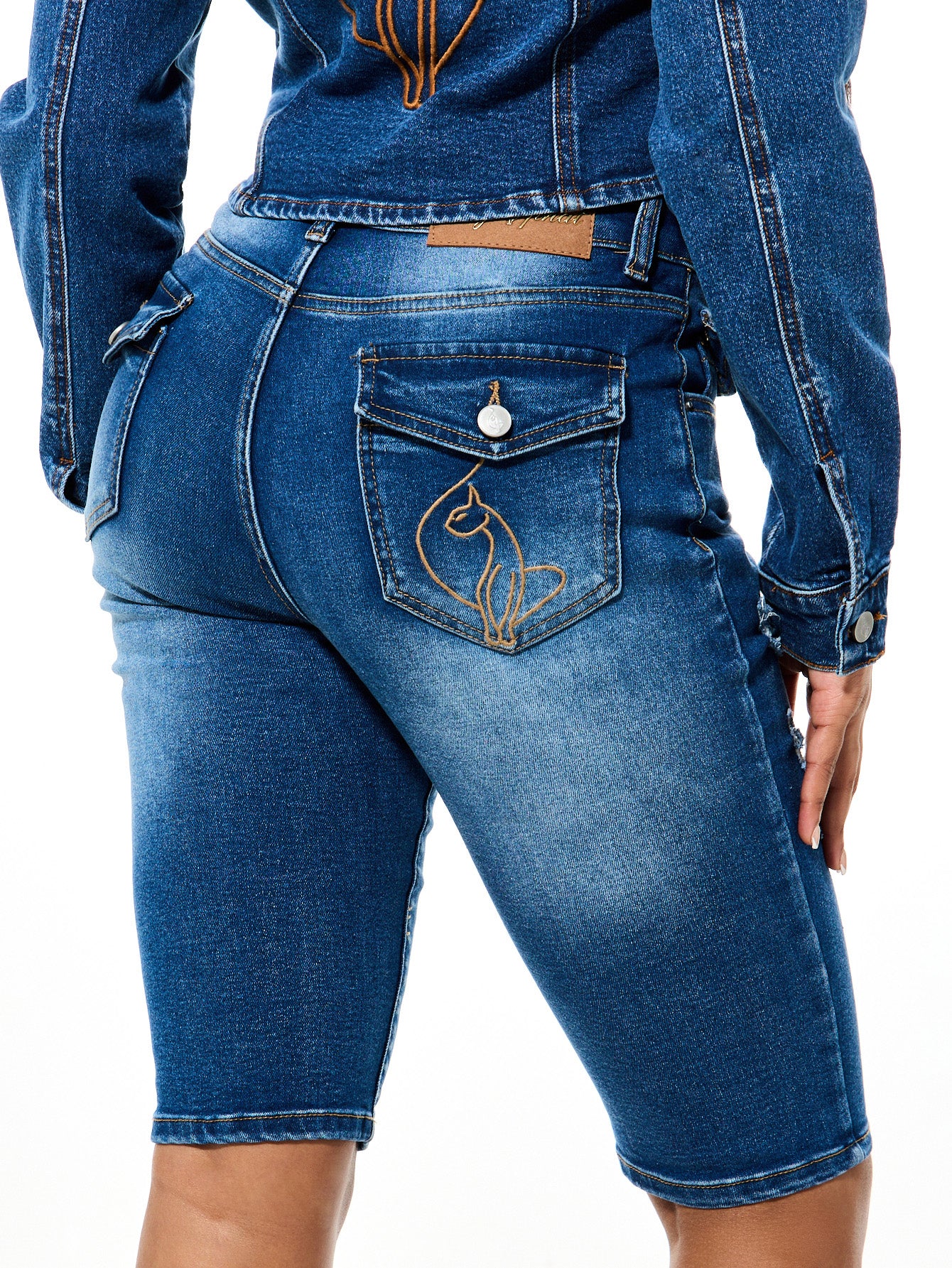 Medium Wash Capri Jean, cat logo flap pocket on back, logo detail
