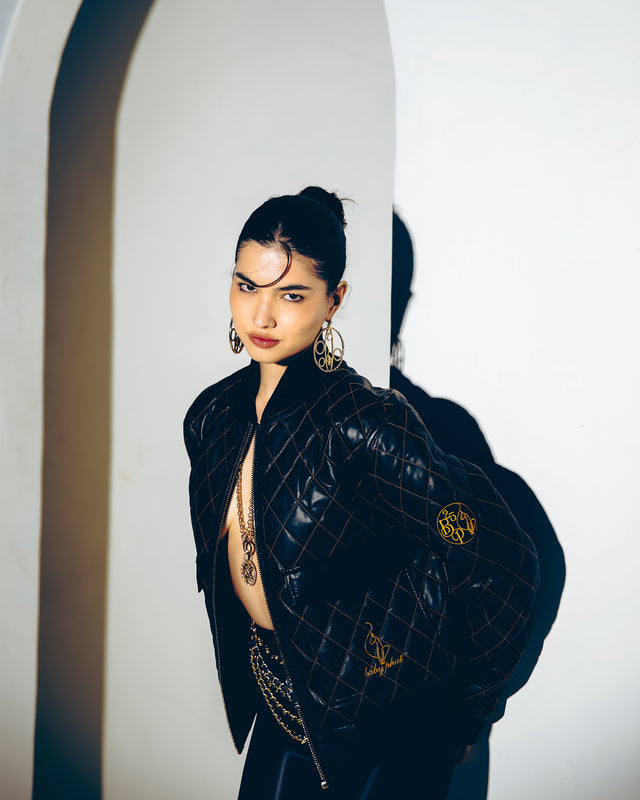 Anniversary Quilted Bomber Jacket, black diamond-quilted sheepskin leather, on-model styling view