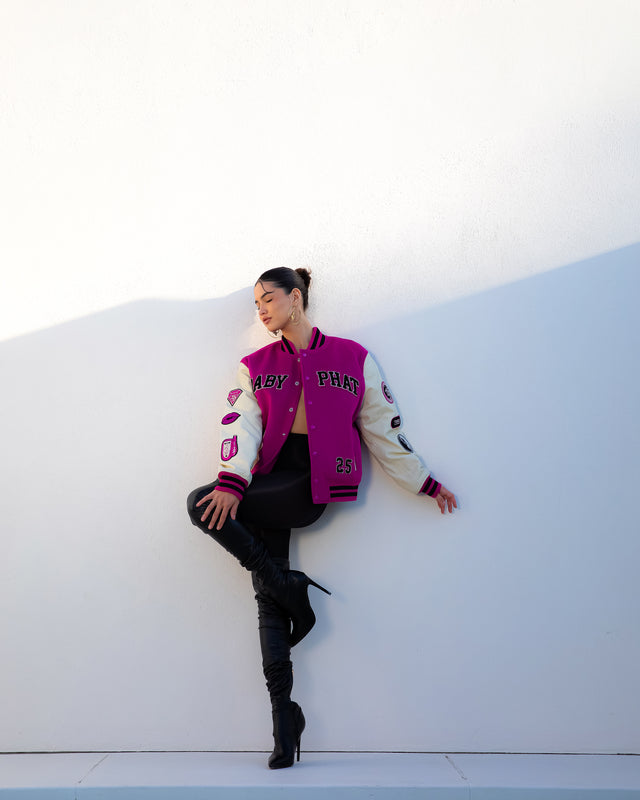 Anniversary Varsity Jacket, magenta and cream with 25th anniversary patches, on-model styling view