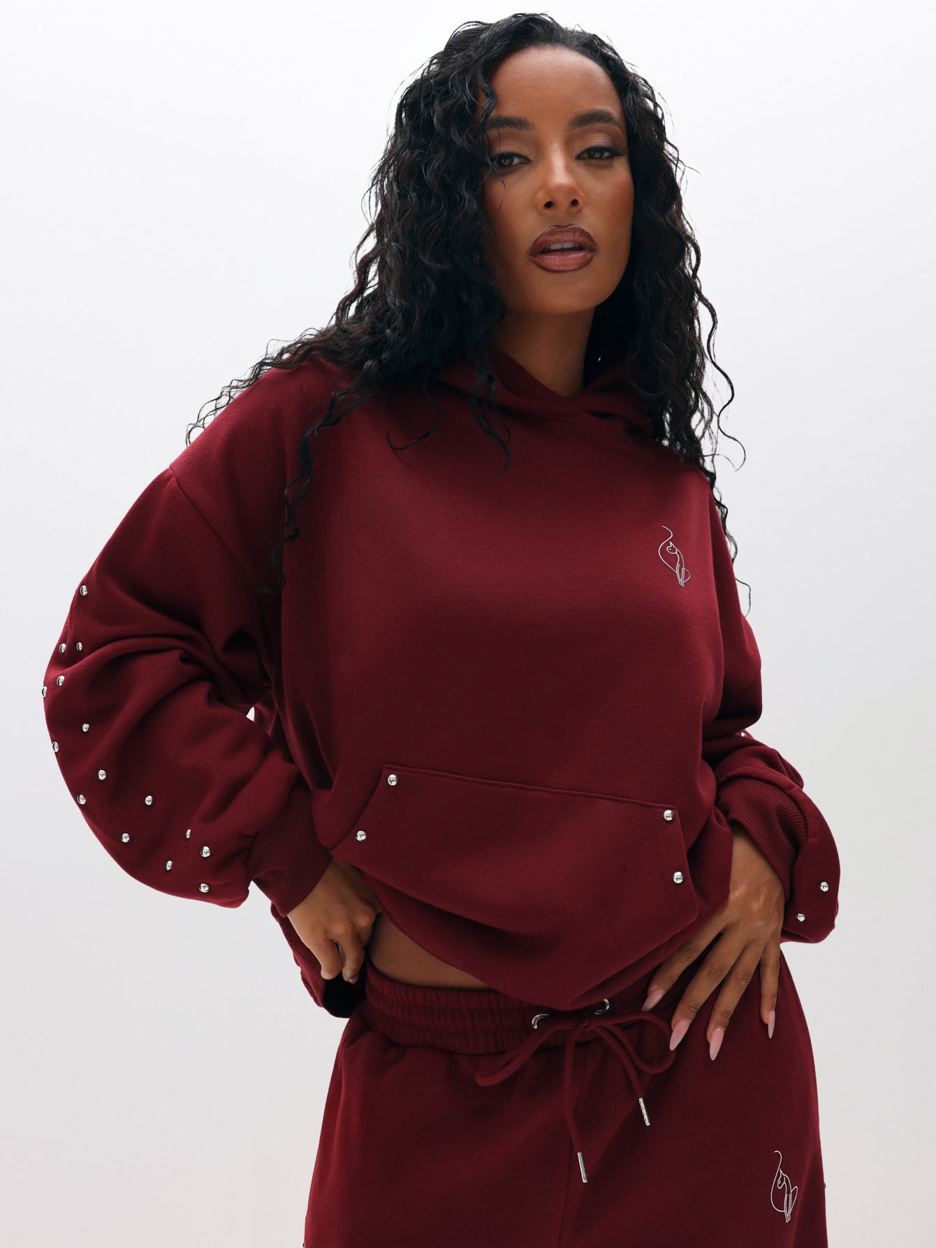 Oversized Hoodie with Stud Detail, burgundy with silver sleeve studs, on-model styling view