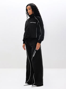 Nylon Track Jacket, curved sleeve piping and cropped fit, side view
