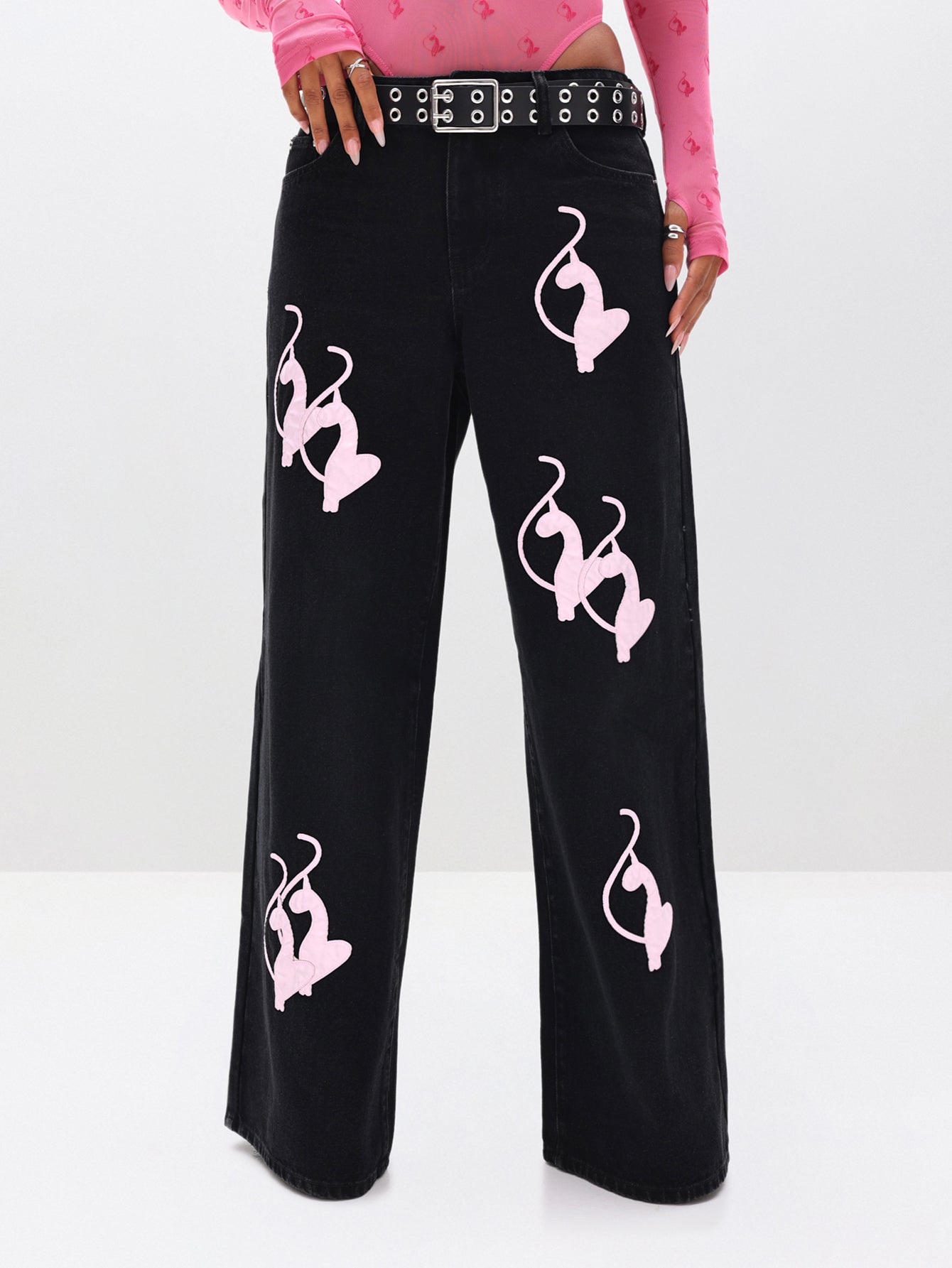 Baggy Fit Jeans with Applique, black denim with pink applique graphics, close-up detail