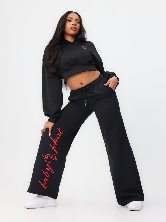 Baggy Wide Leg Sweatpant, black wide-leg silhouette with red script logo, on-model styling view