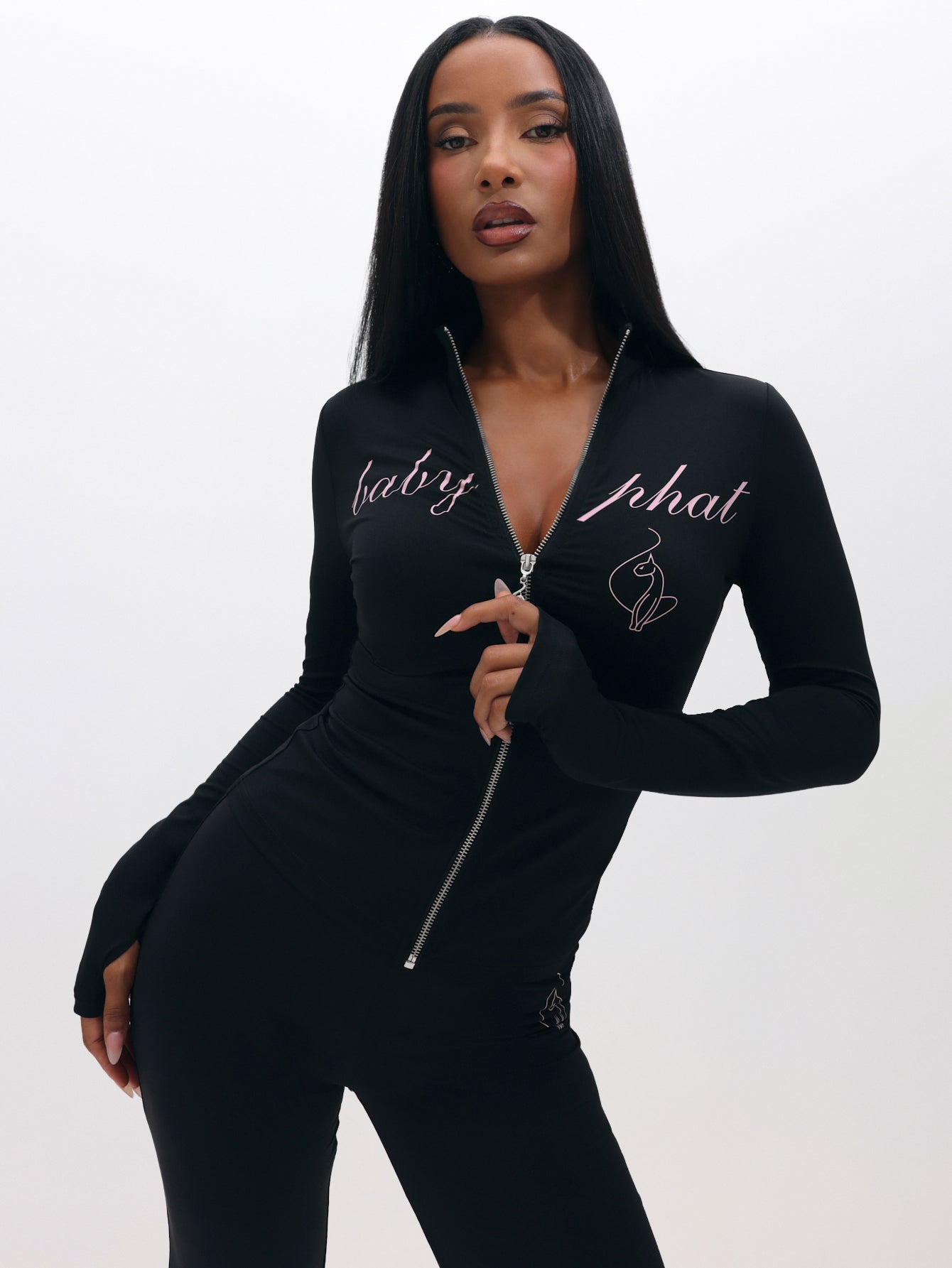 Long Sleeve High Neck Zip Up Top, black fitted silhouette with front zipper and script logo, on-model styling view
