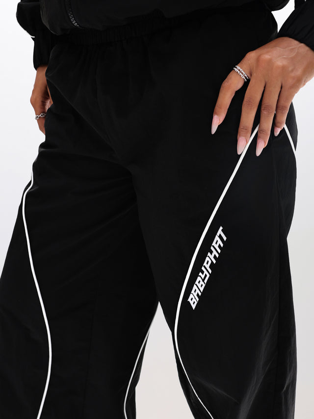 Wide Leg Nylon Trackpants, Baby Phat leg branding, logo detail