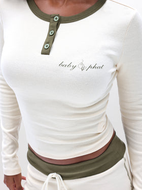 Contrast Trim Henley Top, dark script logo on chest, logo detail