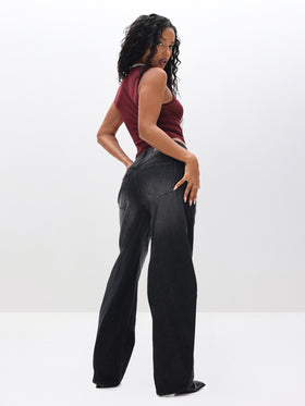 Sleeveless Sheer Mesh Top, burgundy sheer mesh paired with black denim, back view