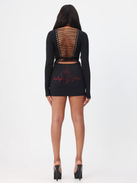 Long Sleeve Mini Dress With Lace Up Back Detail, black mini silhouette with lace-up back and logo script, back view