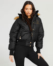 Model shown wearing black puffer jacket. Coat features natural faux fur trimmed detachable hood and Baby Phat script logo on front chest and oversized cat logo on the back. Jacket also features gold cat logo zipper pulls on the front pockets and center front.