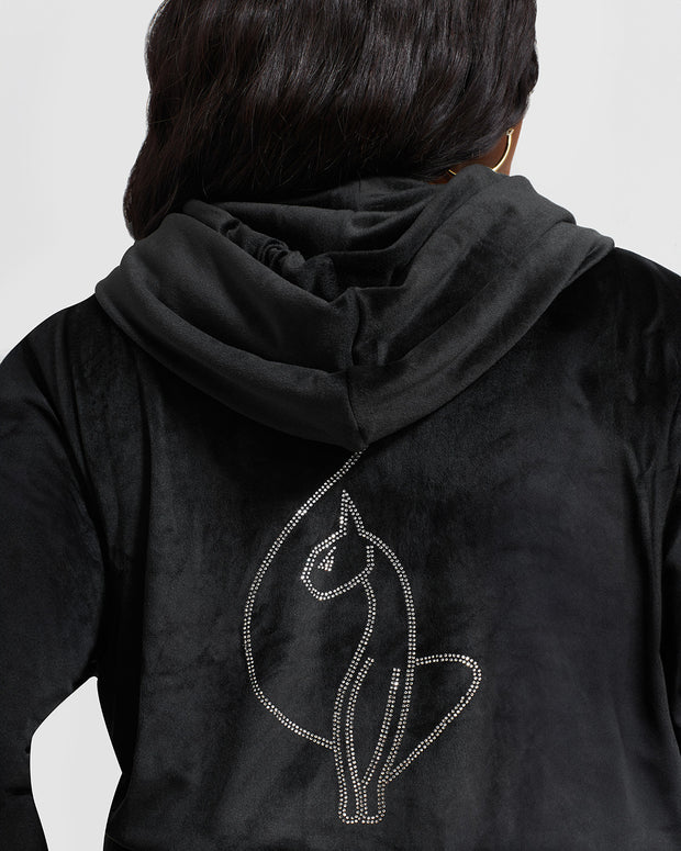 Detail shot of rhinestone Baby Phat cat logo featured on the back of sweatshirt.