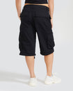 Back view image of standard sized model’s legs wearing black cargo short with visible belt loops. Shorts feature exaggerated pocket detailing down both legs and large pockets on both sides of rear.