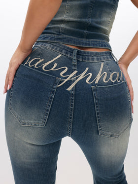 Low Waist Stretch Denim Bootcut Flare, script embroidery over back pockets, close-up detail
