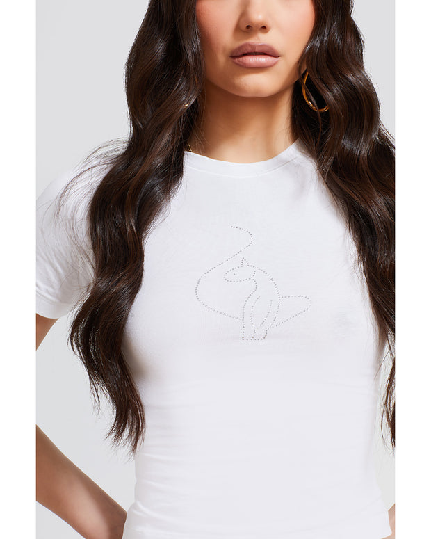 Detail shot of white t-shirt with Baby Phat cat logo in rhinestones on center front.