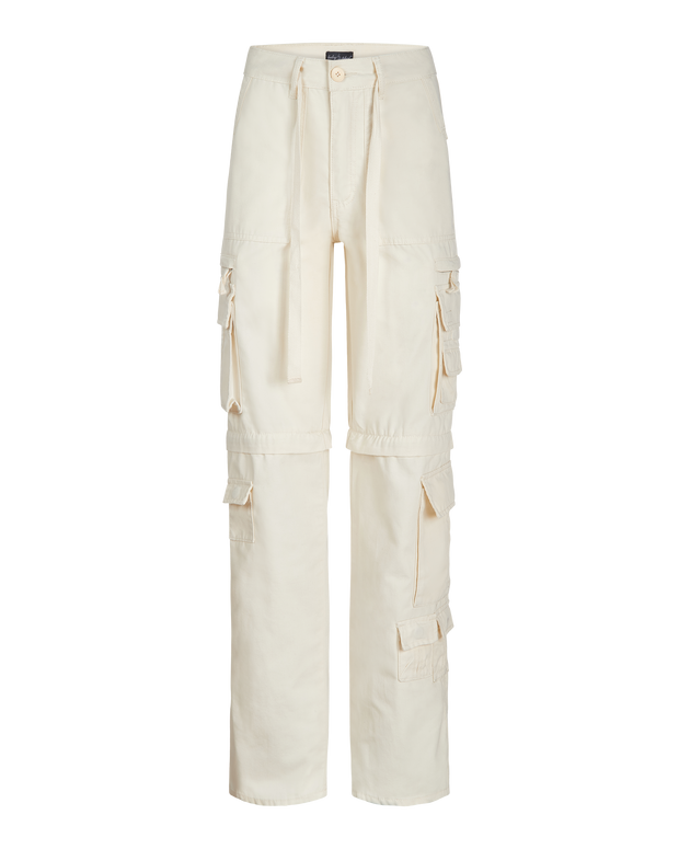 Transformer boyfriend pant in cream features cargo pockets throughout. Pants feature zipper to transform pants into shorts. 