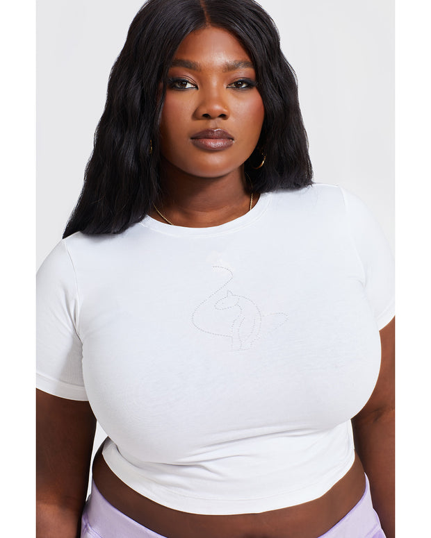 Plus sized model shown wearing white baby tee t-shirt with rhinestone Baby Phat cat logo on center front. 
